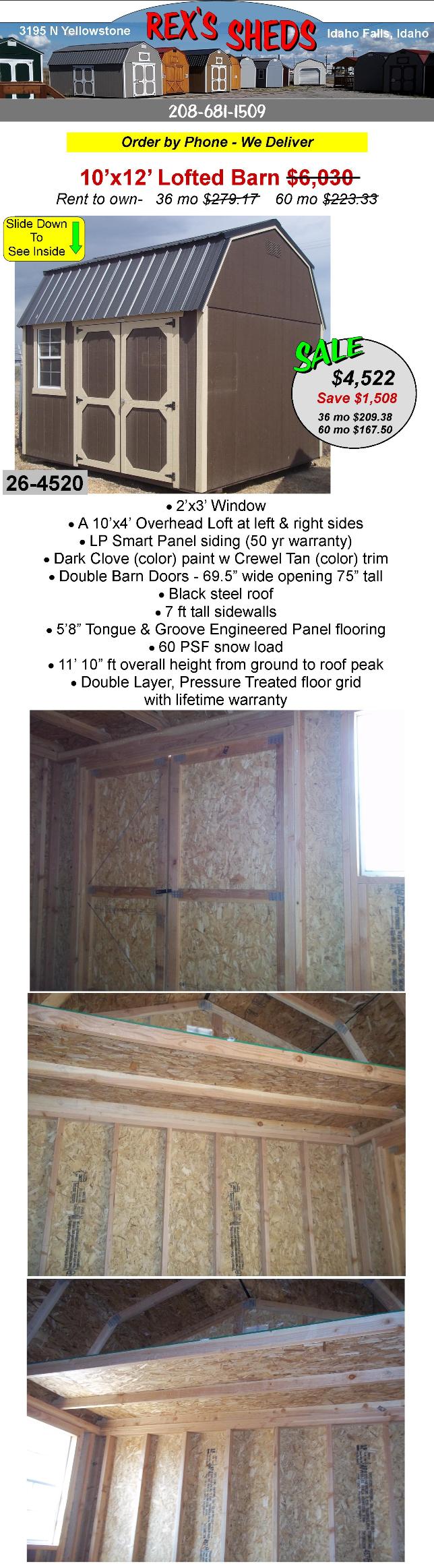 dark_clove_color_barn_shed_with_crewel_tan_color_trim_and_double_barn_doors_a_window_and_an_overhead_loft_at_each_side_has_a_black_steel_roof