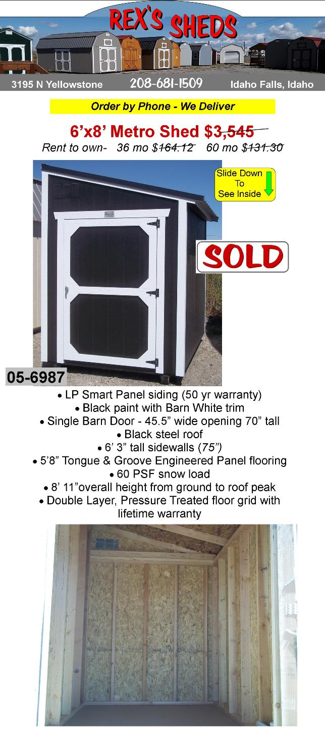 6x8_metro_single_slope_shed_with_single_pitch_lean_to_type_roof_has_single_barn_door_black_paint_barn_white_trim_black_steel_roof