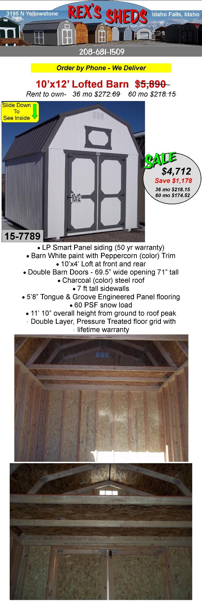 barn_type_shed_painted_barn_white_with_peppercorn_color_trim_has_overhead_loft_at_front_and_rear_charcoal_color_steel_roof_and_double_barn_doors