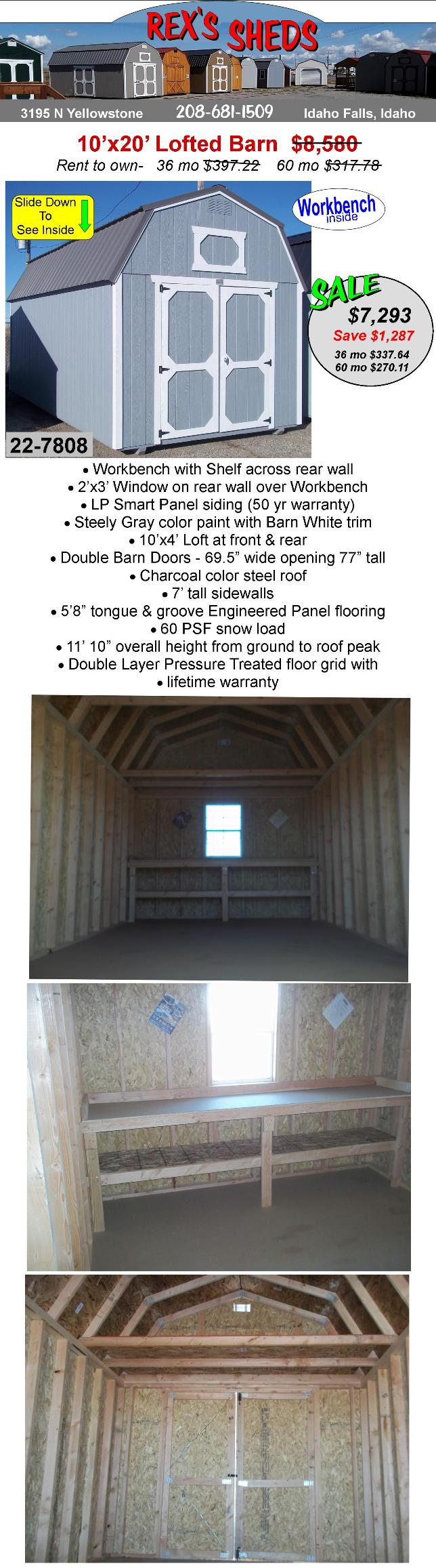 large_shed_with_barn_style_roof_a_window_and_workbench_steely_gray_color_paint_barn_white_trim_and_charcoal_color_steel_roof_double_barn_doors_and_an_overhead_loft_at_front_and_rear