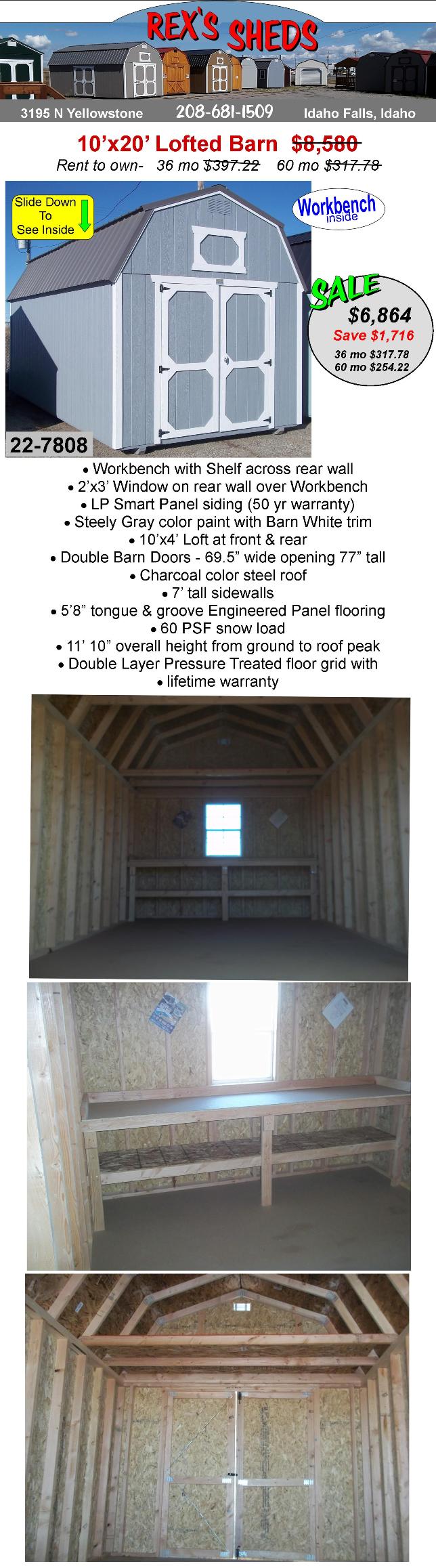 large_shed_with_barn_style_roof_a_window_and_workbench_steely_gray_color_paint_barn_white_trim_and_charcoal_color_steel_roof_double_barn_doors_and_an_overhead_loft_at_front_and_rear